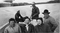 Slim and passengers in boat