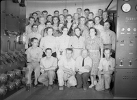 staff 1935 posing in control room