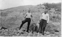 two men with catch of fish