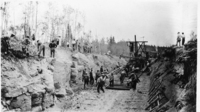Laying Rails through a cut on the Flin Flon line