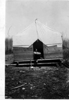  George Evans in doorway of Transport Limited's "tent office" 1929