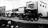 Main Street and Water Wagon 1930's 