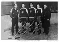 Hec McCaig- (2nd From Left) ..............
