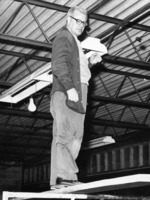 Henry Budlong Installing Lights at New Uptown Curling Rink