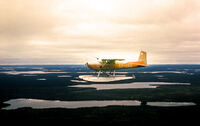 1961 Cessna 180 CF-IXU On Floats Over The Barren Lands