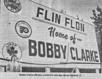 Bobby Clark officially unveils the new sign along Highway 10
