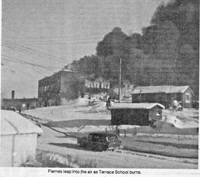 Flames leap into the air as Terrace School burns