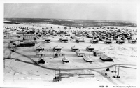 Company Cottages and Town Looking East - 1929-1930 (Post Card)