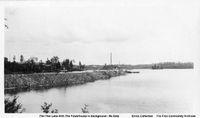 Flin Flon Lake With The Powerhouse In The Background-........