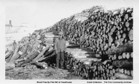Cord Wood Piled By The Pilot Mill and Powerhouse 1928