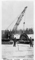 Marion Crane Loading Freight On Sleighs. ( C 1929)