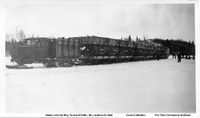 Linn Tractor Pulling Load Of Dump Cars And Caboose To Island Falls (C 1929/30)