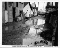 Back Alley Behind Businesses On East Side Of Main Street 