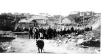 R. H. Channing leading striking workers back to work 