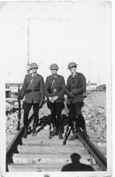 RCMP Officers with rifles and army helmets 