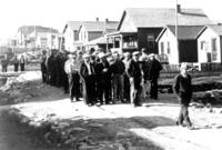 R. H. Channing leading the men back to work