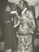 Jim Goodman getting dressed into his costume, for The Mikado,
